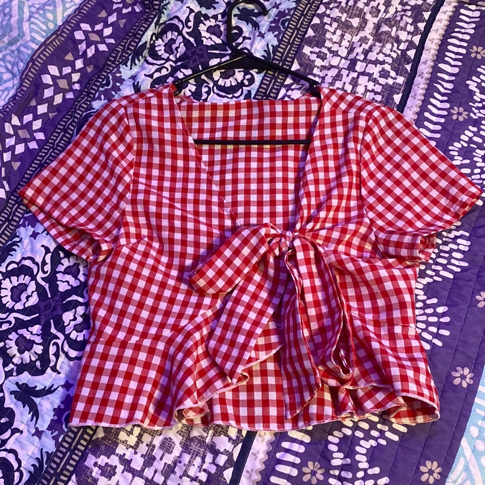 Really cute plaid tie front shirt with ruffles